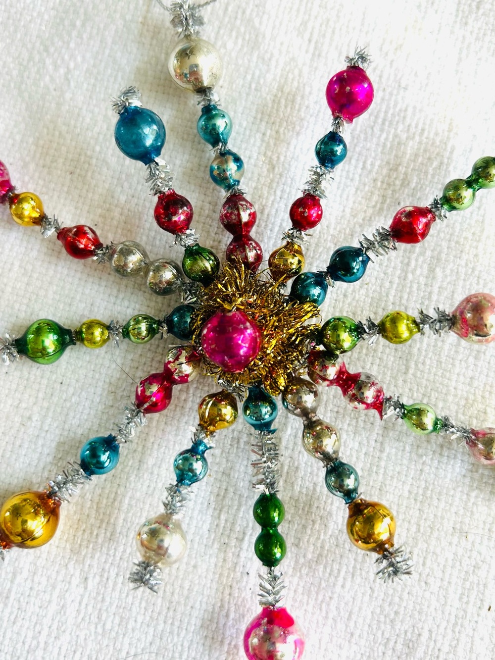Vintage repurposed holiday star burst Christmas Ornament
